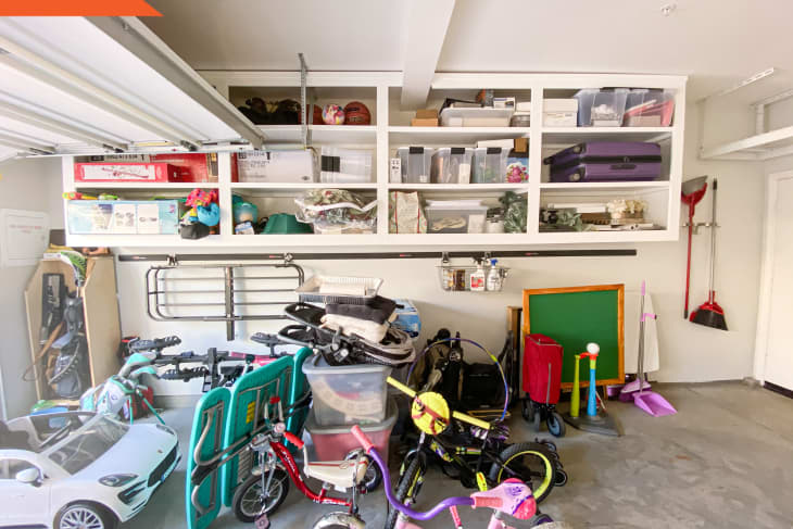 Before: kids toys and bikes  on the garage floor