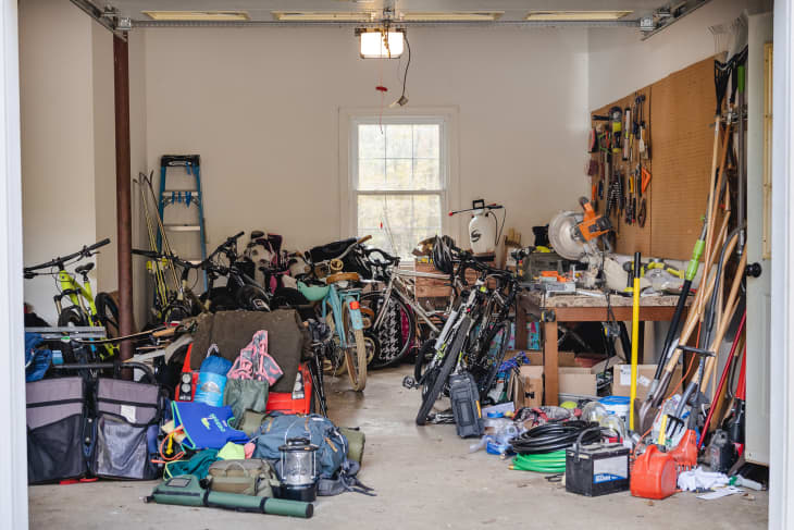 Before: an open garage with toys and tools scattered on the floor