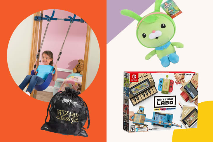 Child on indoor swing, green plush toy, Harry Potter chess set bag, and Nintendo Labo Variety Kit box.