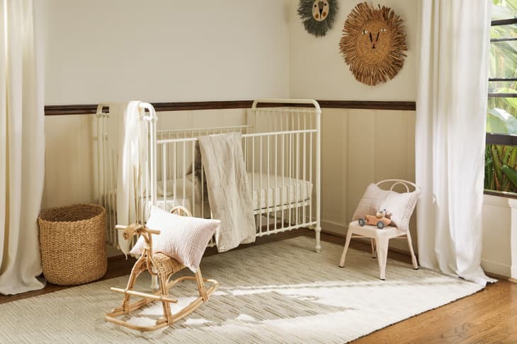 nursery with crib and rocking horse