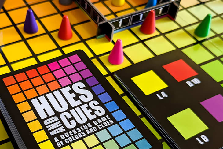 Product photo of Hues and Cues board game mid-play