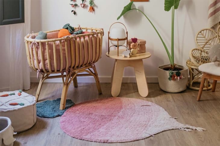 Lorena Canals Nursery with lots of natural accents, radish rug