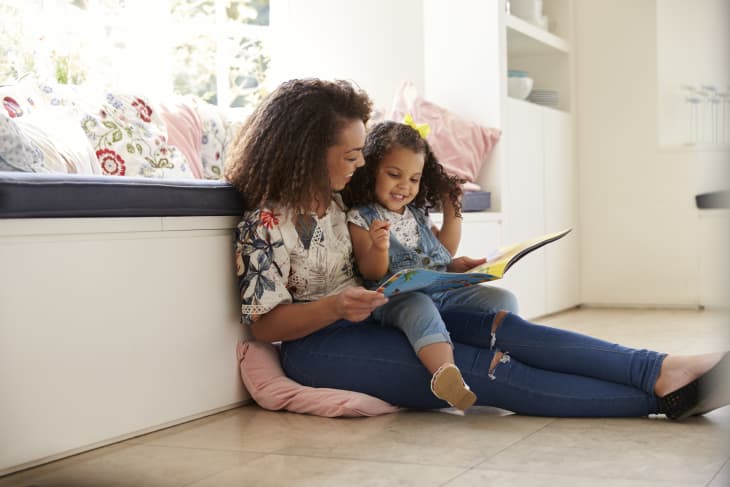 Mother and daughter reading together