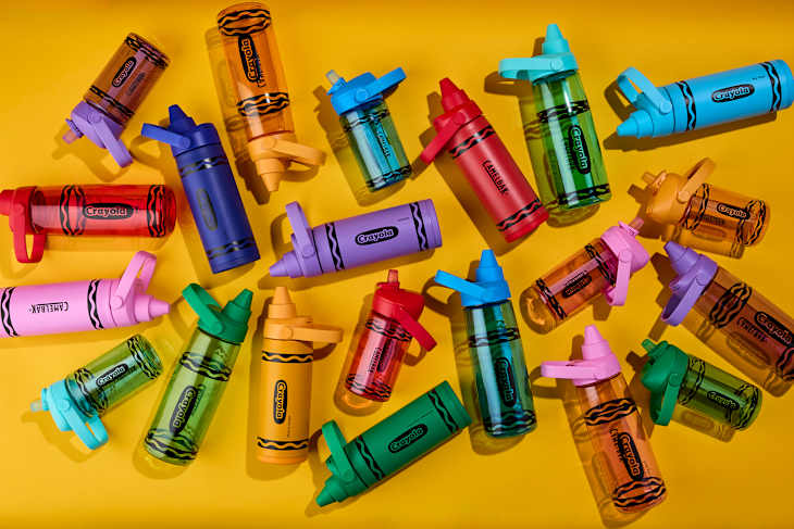 CamelBak/Crayola water bottles on colorful background