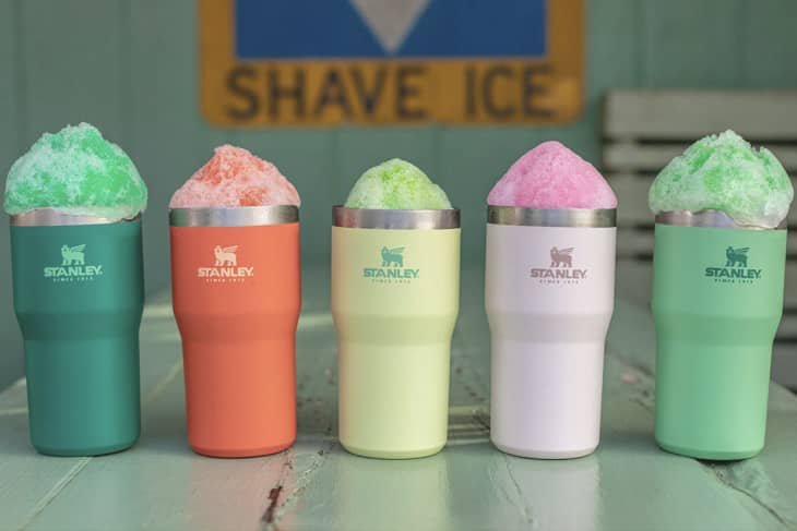 Stanley travel tumblers in six different colors containing shaved ice