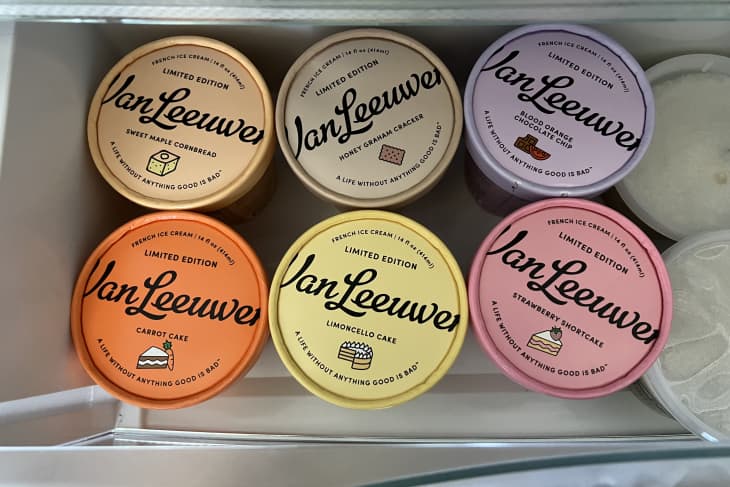 Variety of Van Leeuwen ice cream pints in freezer.