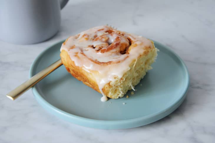 cinnamon roll on a plate with fork