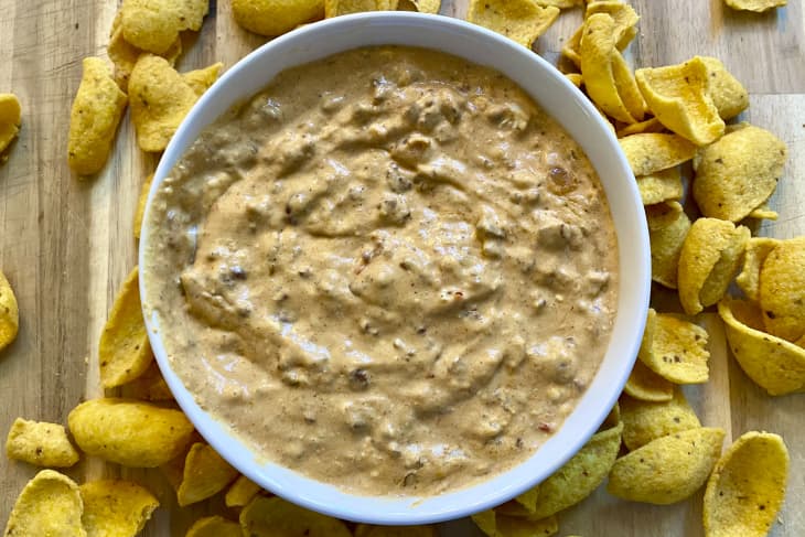 Two-Ingredient Cream Cheese Dip in a bowl surrounded by Fritos.
