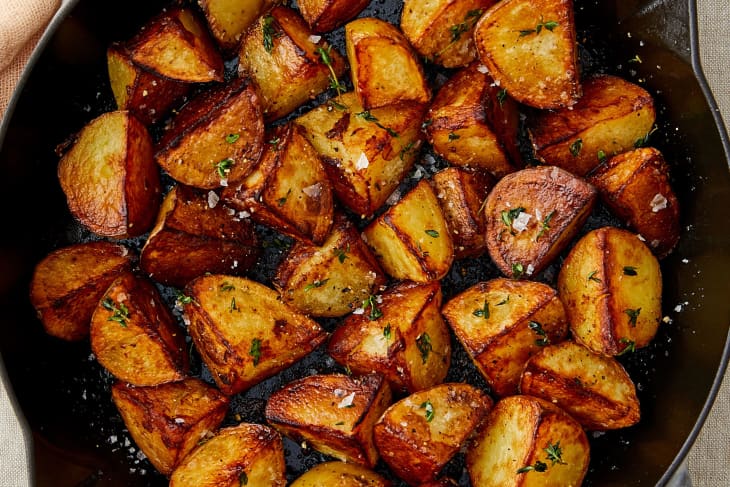 Crispy skillet fried potatoes in skillet.