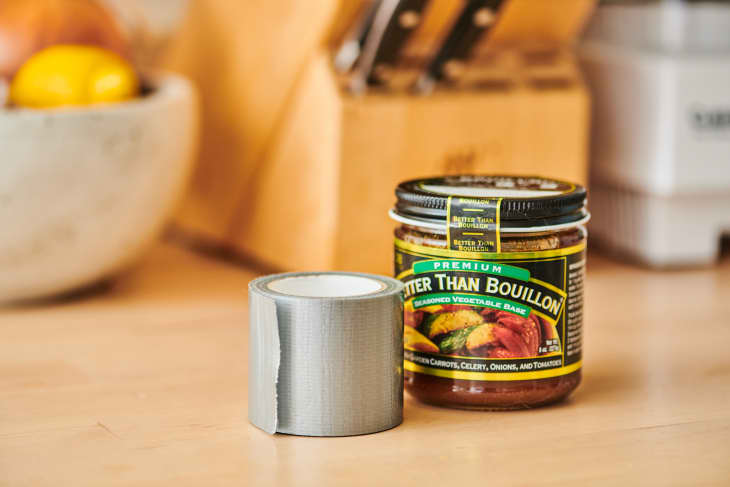 roll of duct tape and jar on kitchen counter