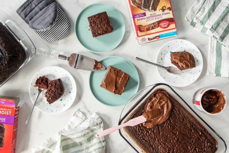 Various chocolate cakes on table.