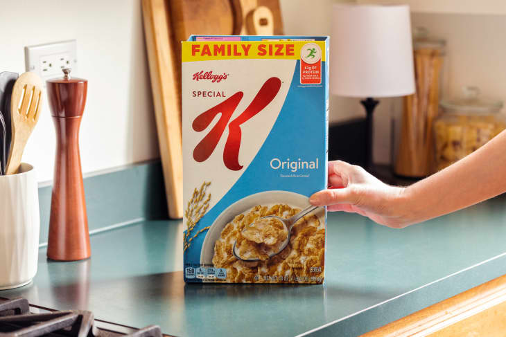 Empty cereal box on counter.