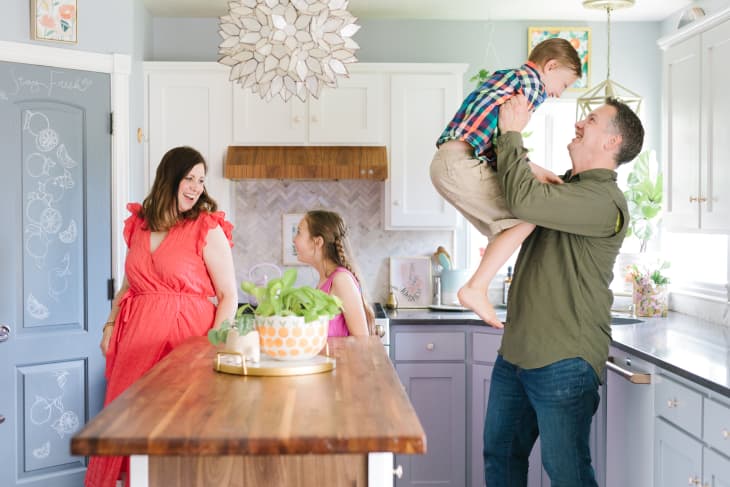 Laurel Harry and family in kitchen.