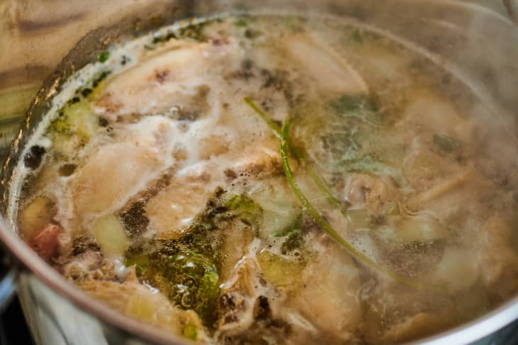 chicken stock simmering in pot
