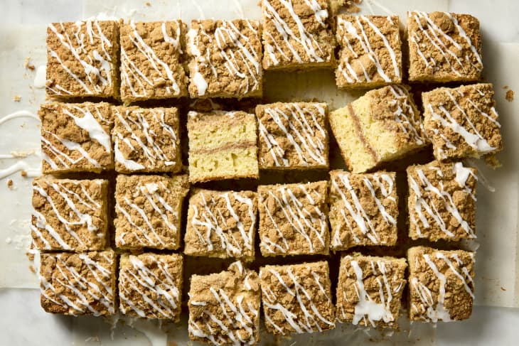 overhead shot of the coffee cake cut up into small pieces, with a few pieces moved about.