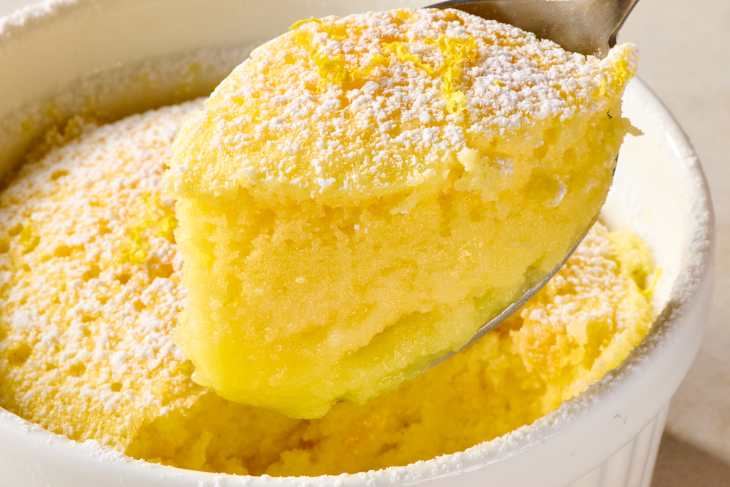 overhead shot of lemon pudding cake in a dish