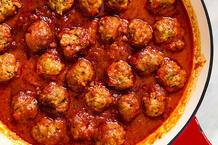 close up of meatballs in pan