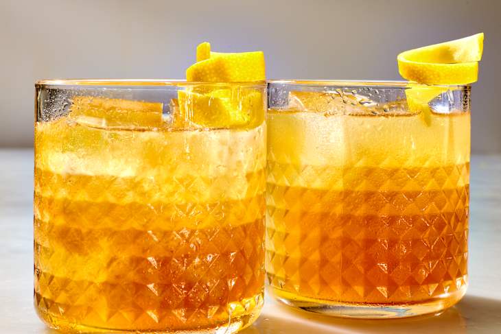 2 gold rush cocktails in rocks glasses