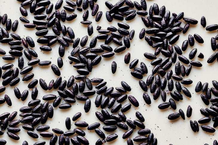 black rice grains on a table