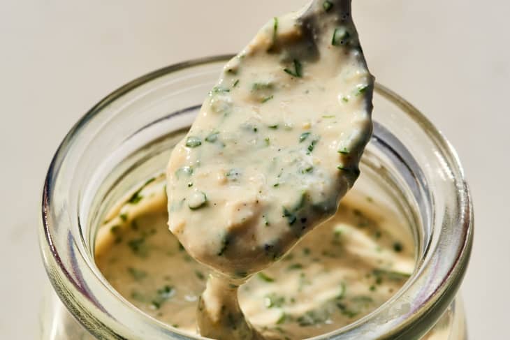 tahini herb sauce in a mason jar