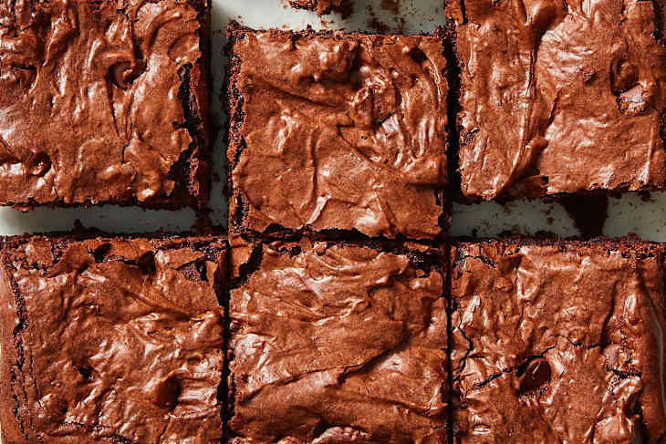 Overhead photo of Handle the Heat's chewy brownies on a marble surface