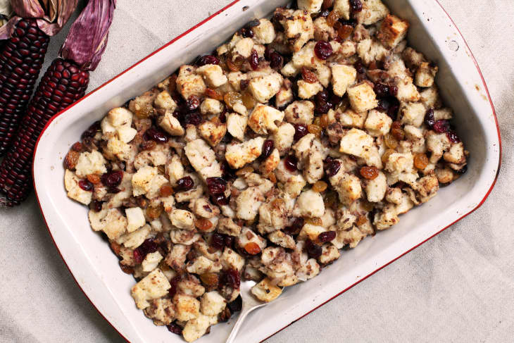 Canadian-Syrian Thanksgiving stuffing, which has cubed white bread, raisins, dried cranberries, and spices, in a casserole