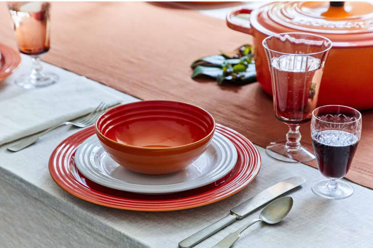 Table setting with Le Creuset bowl and plates