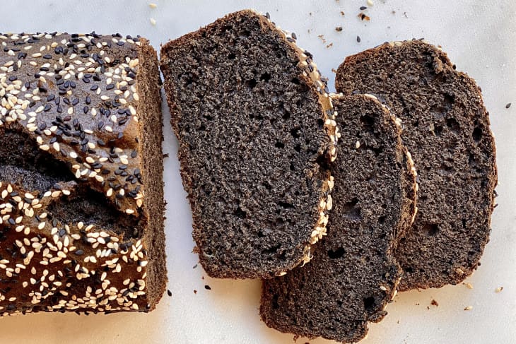 Loaf of Black Sesame Banana Bread, partially cut into slices