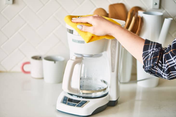 Cleaning the store coffee pot