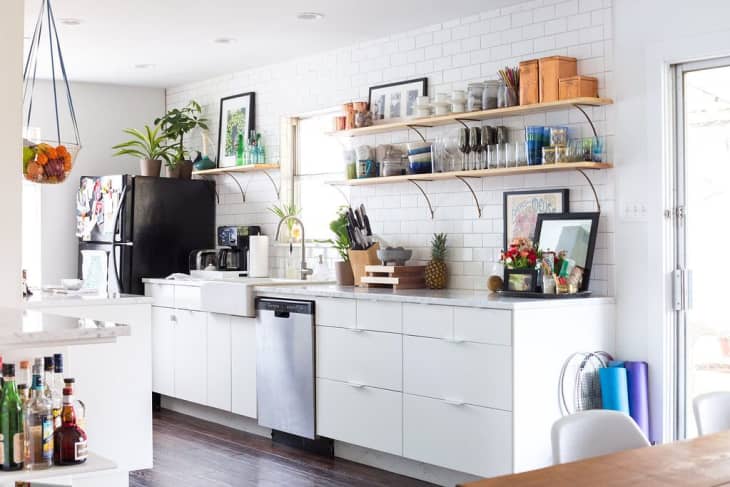 Kitchen with a lot of white tile