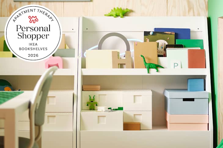 Colorful bookshelf display using IKEA Bergig shelves with IKEA Bookshelves Personal Shopper seal on left.
