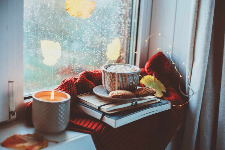 Breakfast With Books And Sweater On Window Sill At Home