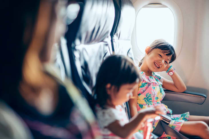 Little girl portrait with smiling on airplane