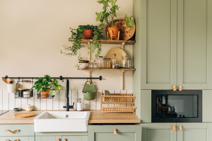 Utensil Stand Hanging On Kitchen Wall High-Res Stock Photo - Getty Images