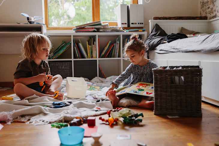Untidy House, children are playing in messy room.