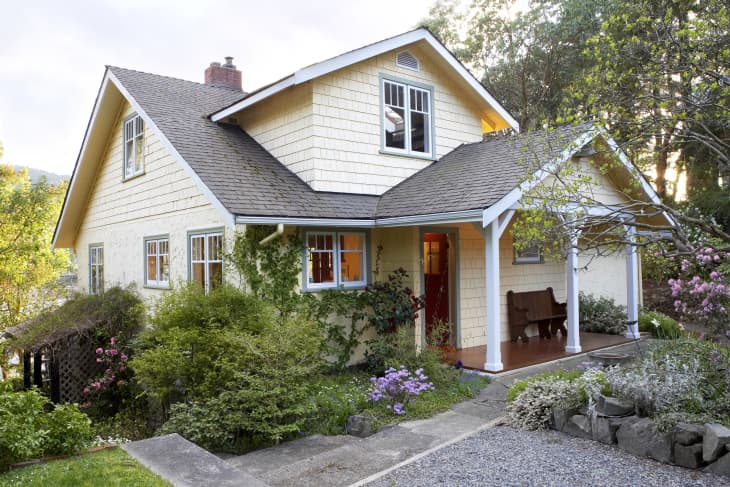 Exterior of cottage style house with front yard