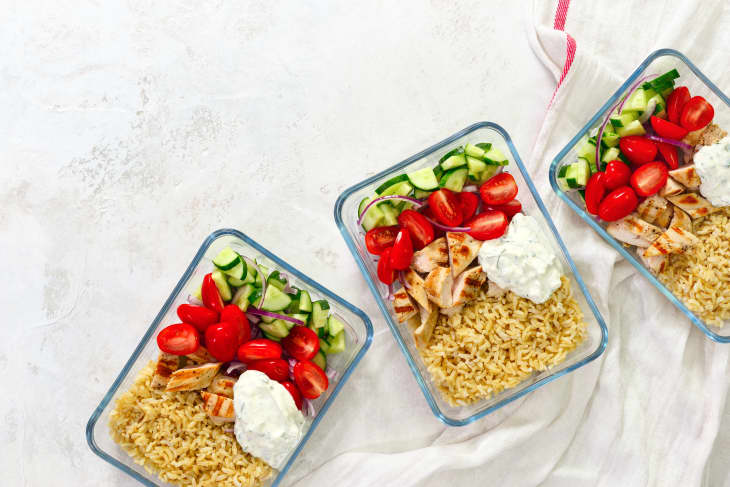 Greek chicken with tzatziki prepared and ready to eat in a take away lunch boxes.