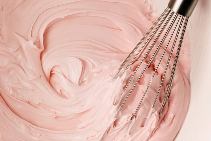 Whisk in strawberry frosting