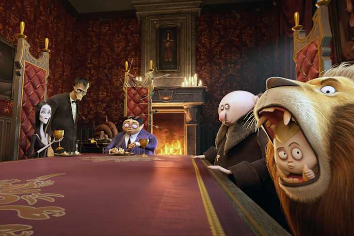 THE ADDAMS FAMILY, from left: Morticia Addams (voice: Charlize Theron), Lurch (voice: Conrad Vernon), Gomez Addams (voice: Oscar Isaac), Uncle Fester (voice: Nick Kroll), Pugsley (voice: Finn Wolfhard), Kitty Kat the Lion, 2019. © MGM / courtesy Everett Collection