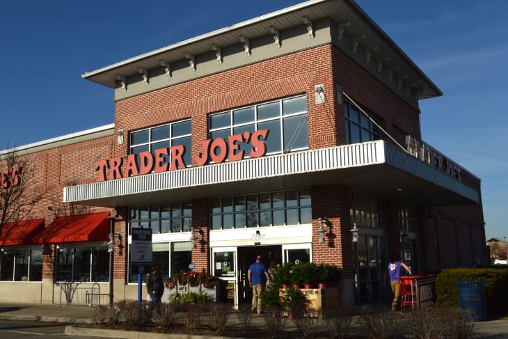 Trader Joe's exterior and sign. Trader Joe's is an American privately held chain of specialty grocery stores headquartered in Monrovia, CA.