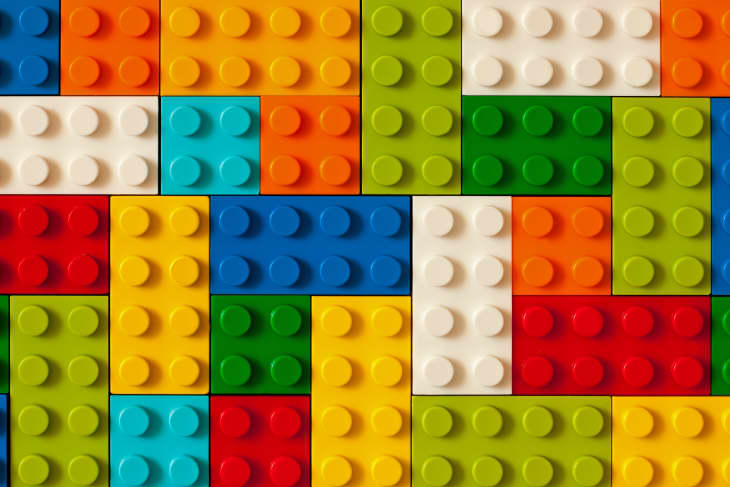 colorful lego building blocks laid out in a gridlike pattern