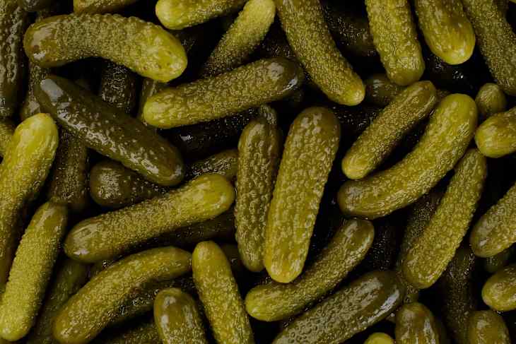 Pickled gherkins cucumbers top view