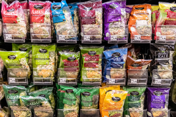Taylor brands Bagged assorted organic salads kits for sale in a supermarket aisle