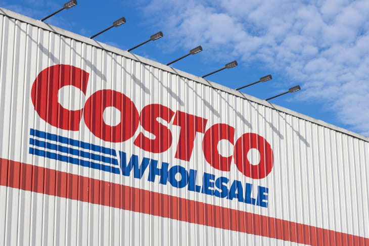 Tigard, OR, USA - Oct 31, 2023: Closeup of the Costco logo seen at its store in Tigard, Oregon. Costco Wholesale Corporation operates a chain of membership-only big-box retail stores.