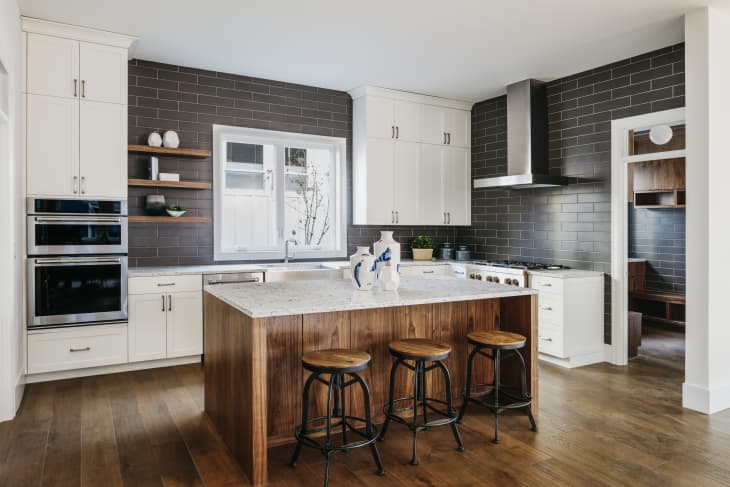 Modern kitchen with the hardwood floors.