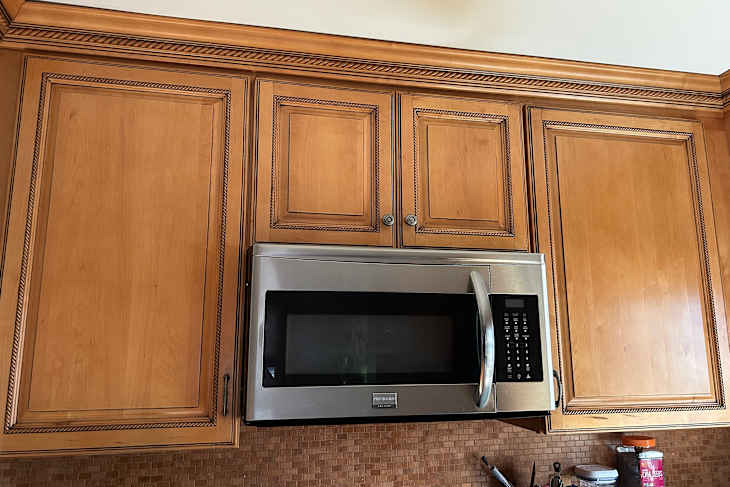 Favorite method to clean greasy kitchen cabinets uses Murphy's Oil Soap Spray.