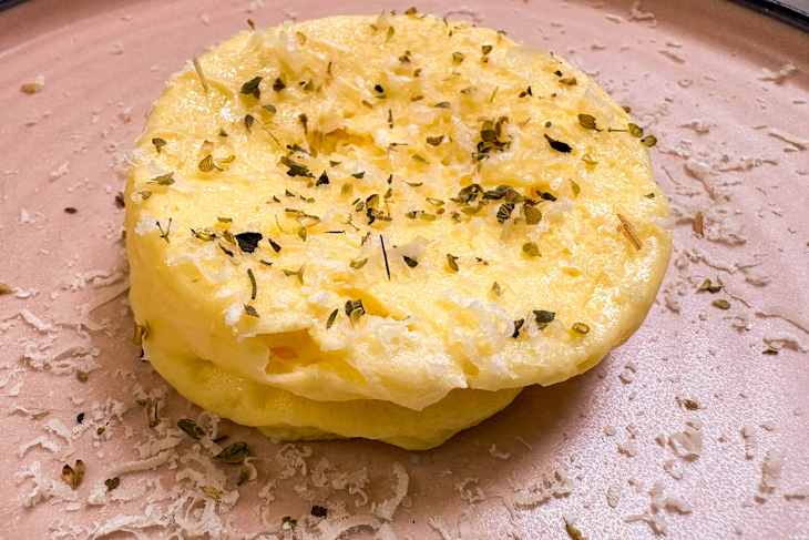 Mayonnaise microwave eggs garnished on plate.