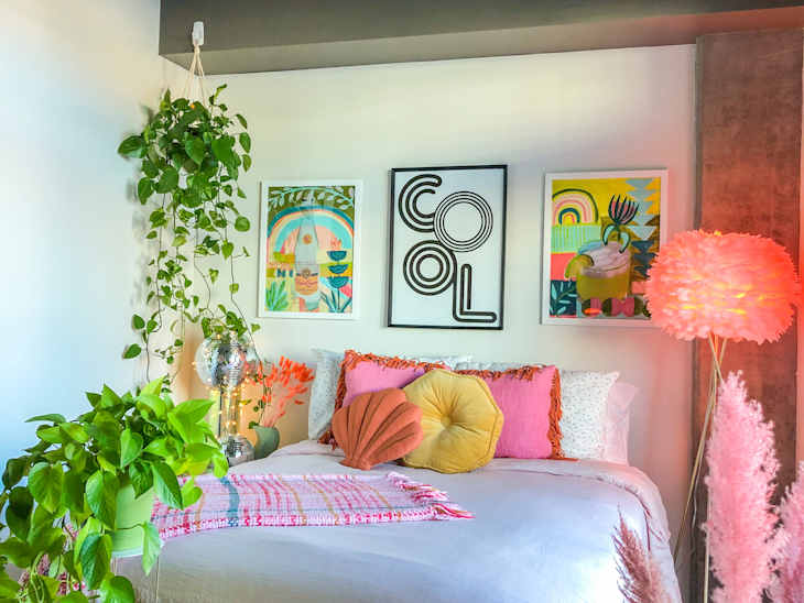 Bedroom with plants and pink lights