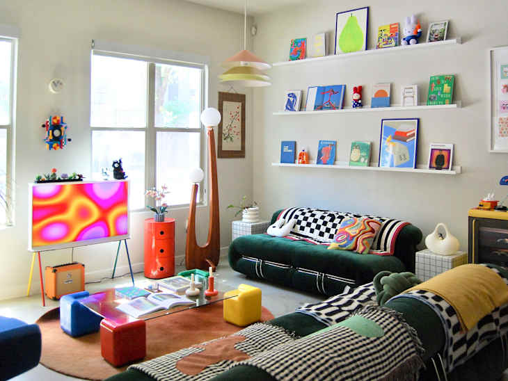 Tchotchkes on shelves in eclectic living room.