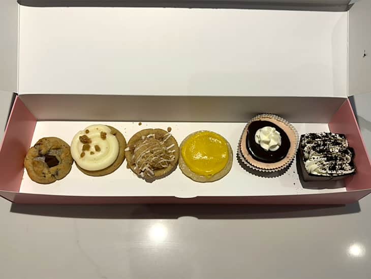 Assorted box of Crumbl cookies.